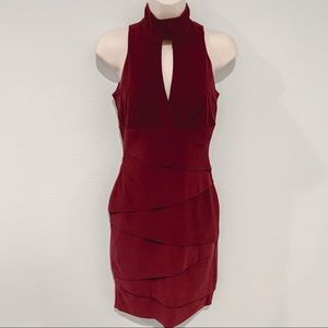 Instantly slimming keyhole burgundy dress